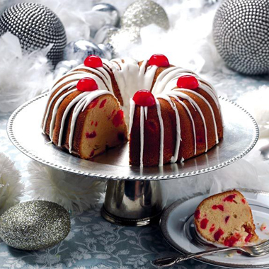 Holiday manhattan bundt cake with cherry topping