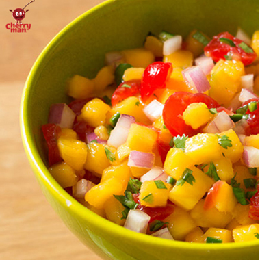 Maraschino cherry and mango salsa with onions and pepper
