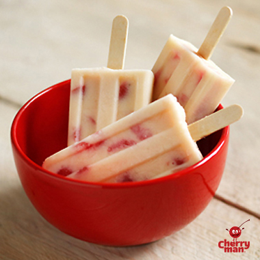 Coconut water, cherry and banana popsicles served in red bowl